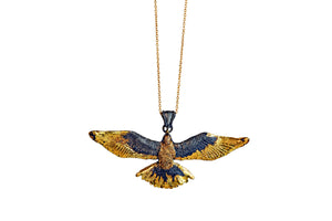 Gold Accented Flying Bird Pendant